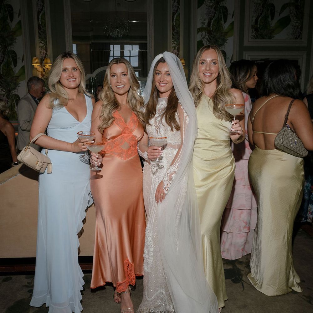 wedding-guests-wearing-pastel-bridesmaid-dresses