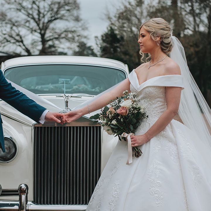 bride-and-groom-hold-hands
