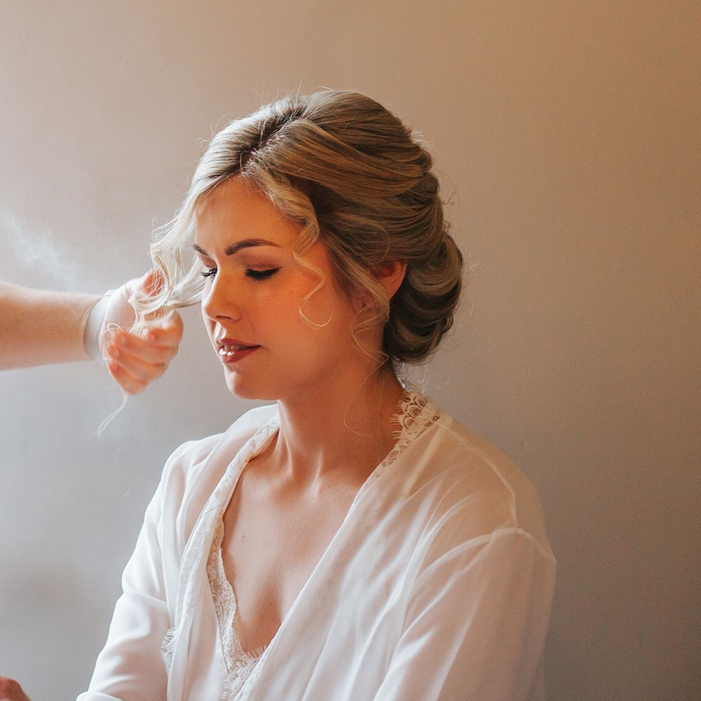bride-gets-hair-done-for-wedding-day