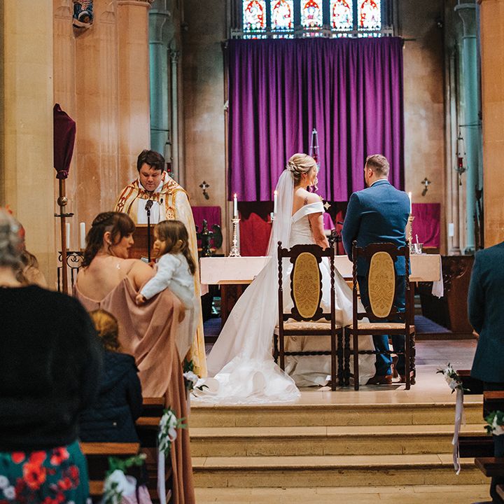couple-exchanges-vows-during-wedding-ceremony