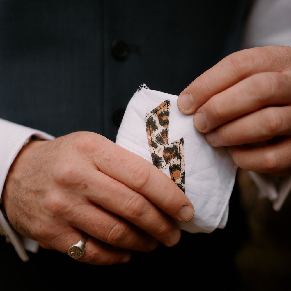 leopard-print-lightning-bolt-stitche-onto-shirt-for-groom