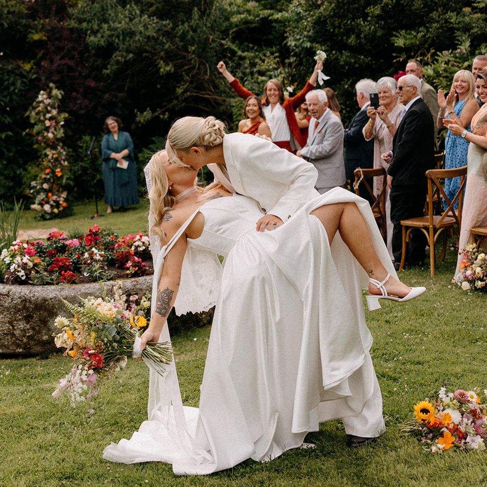 brides-share-passionate-kiss-at-wooladon-estate-wedding