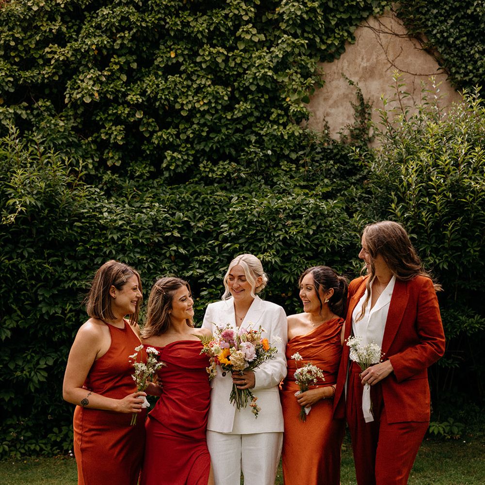burnt-orange-bridal-party-dresses-and-suits-for-autumnal-wedding