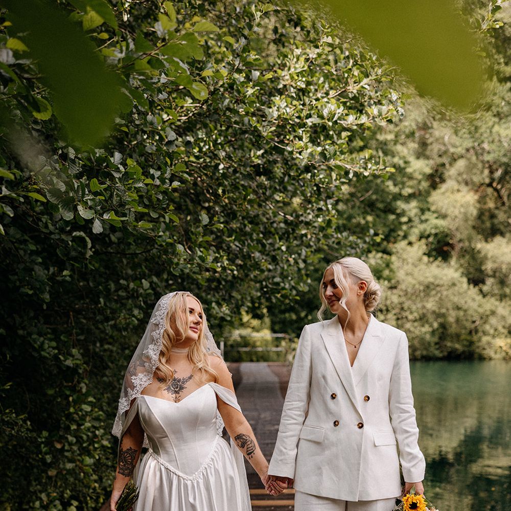 double-breasted-white-wedding-suit-and-bride-in-corset-wedding-dress
