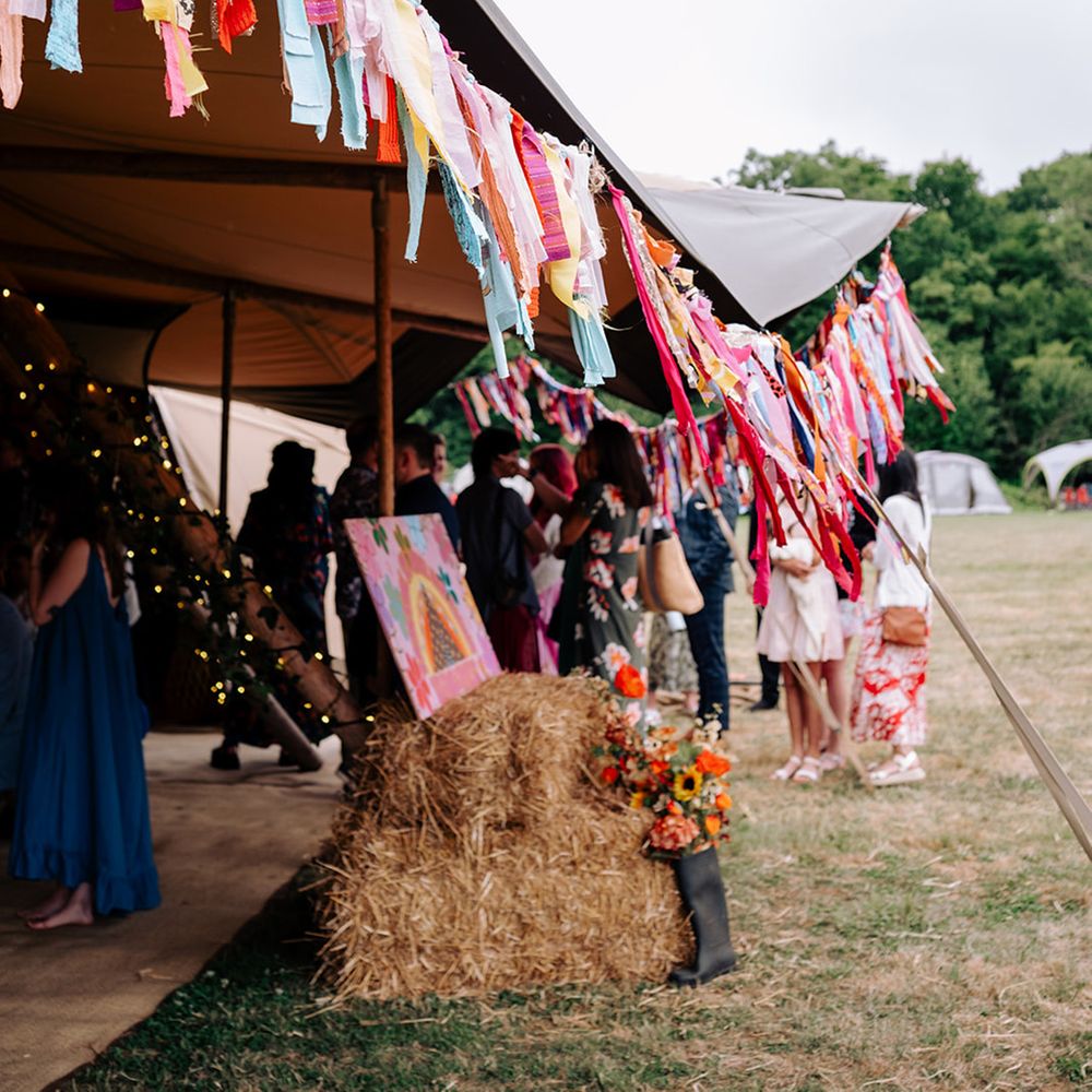 bright-colourful-wedding-streamers-tipi-wedding