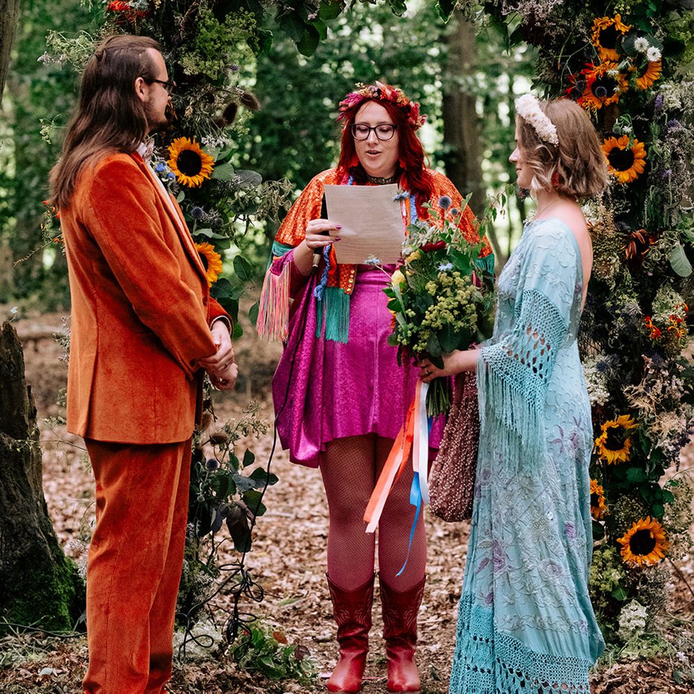 Outdoor-woodland-wedding-ceremony-with-sunflower-arch