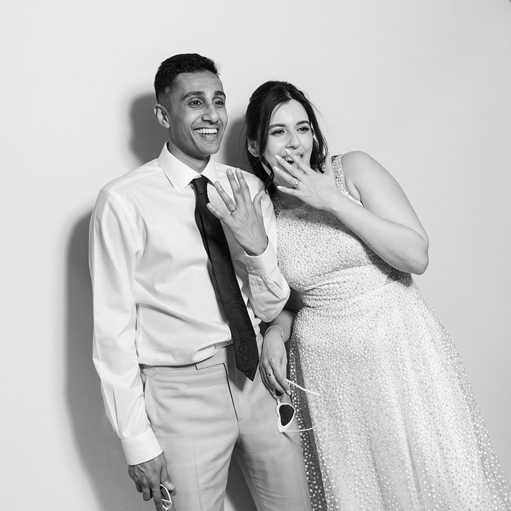 black-and-white-photo-booth-picture-of-bride-and-groom
