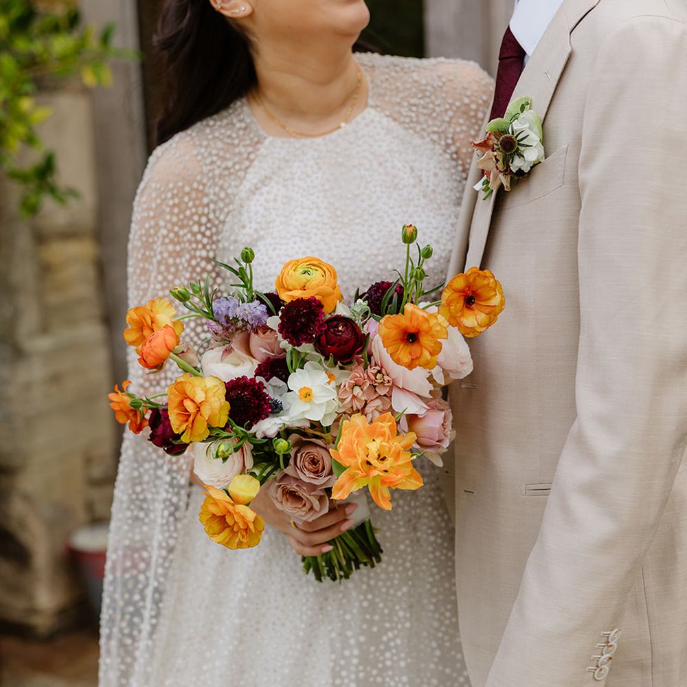 bridal-bouquet-with-orange-red-flowers