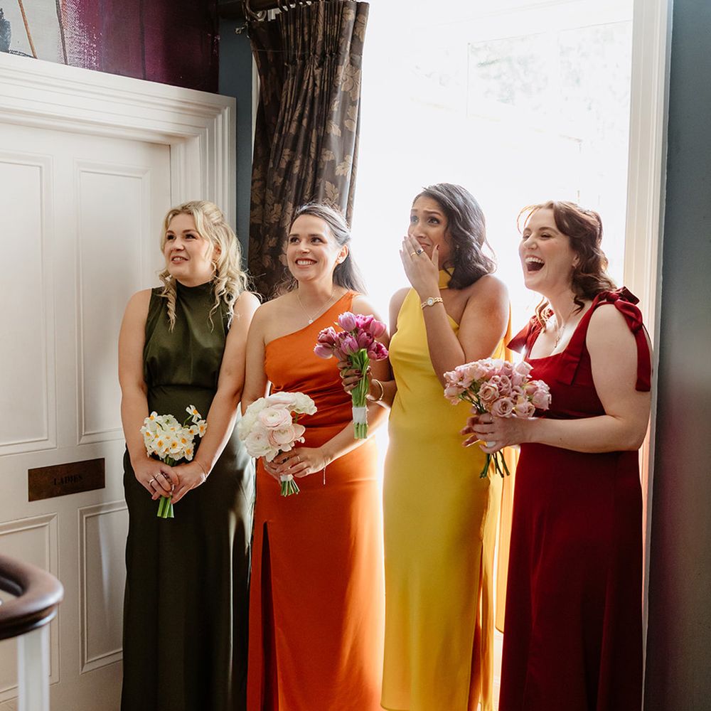 bridal-party-first-look-in-autumnal-bridesmaid-dresses
