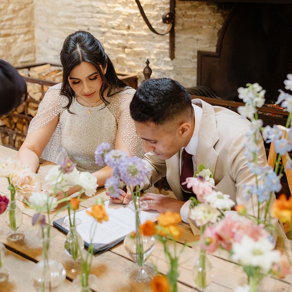 bride-and-groom-sign-wedding-register