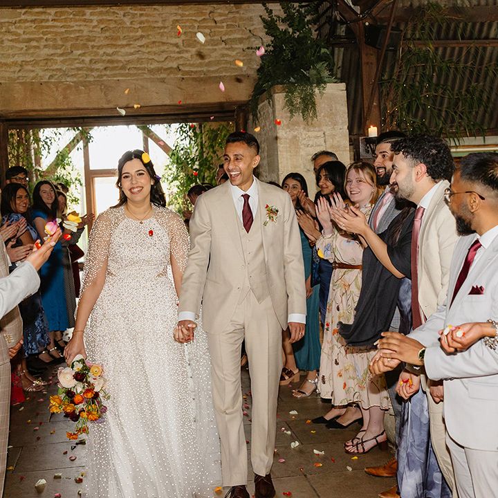 confetti-exit-at-stone-barn-wedding