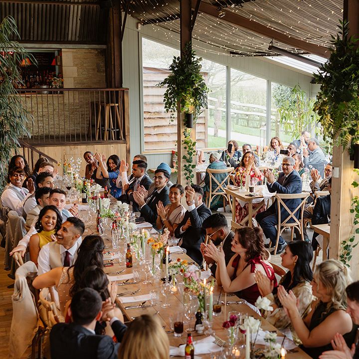 stone-barn-wedding-breakfast-with-wedding-guests