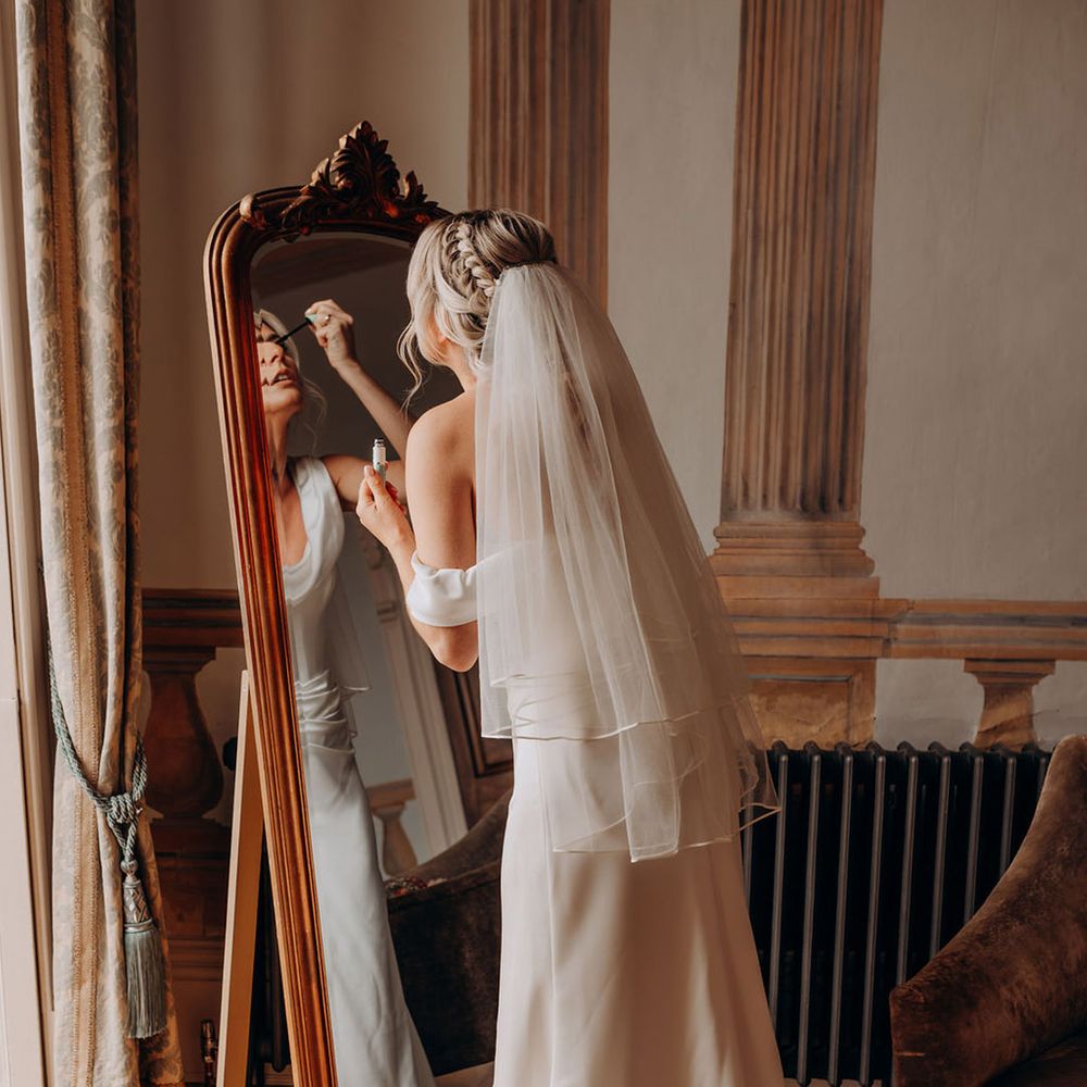 bride-does-her-mascara-on-wedding-day