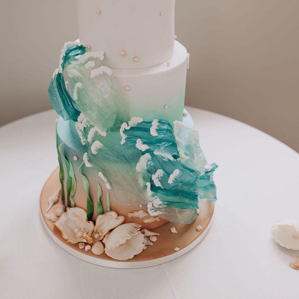 Unique wedding cake with 3D seashell and sea details