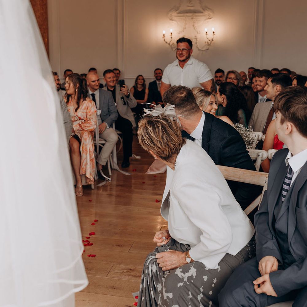 surprise-wedding-guests-sitting-in-audience