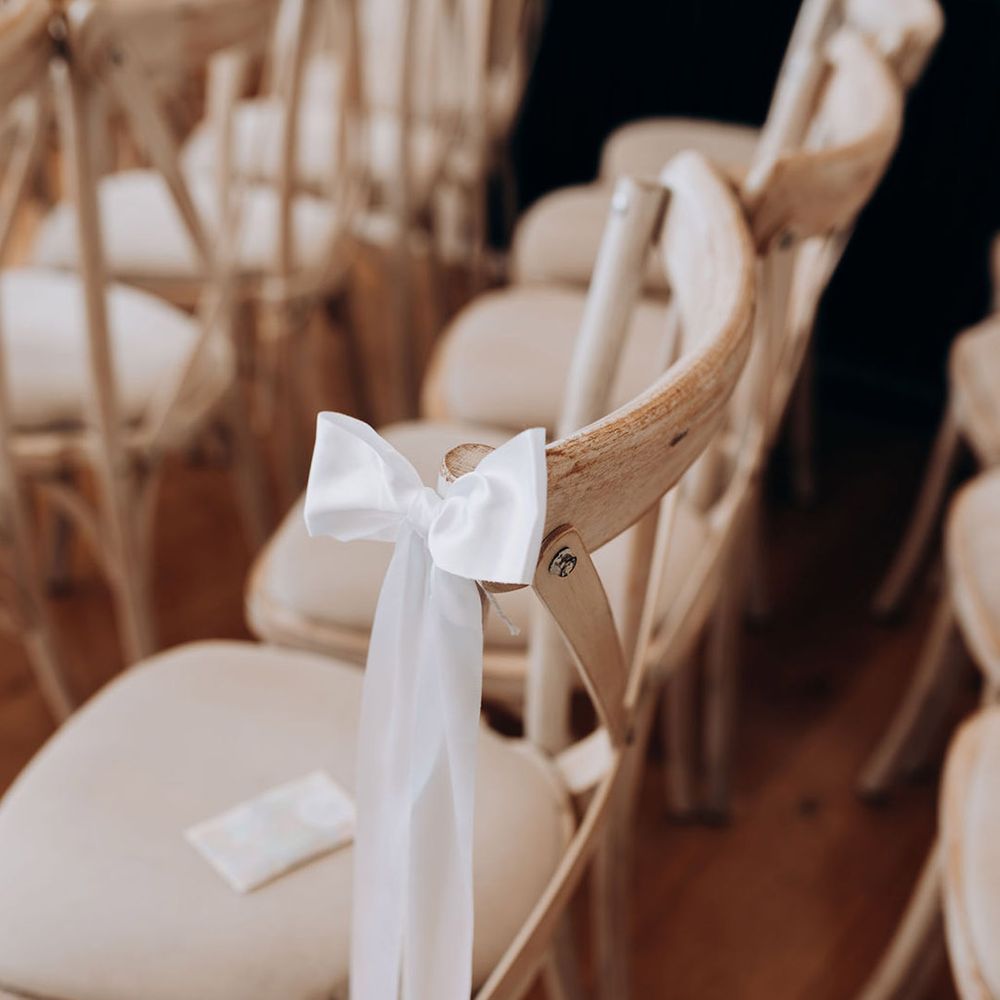 white-bow-wedding-chair-decor.