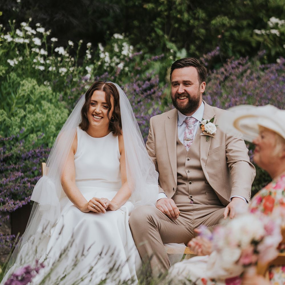 bride-and-groom-seated-for-wedding-ceremony