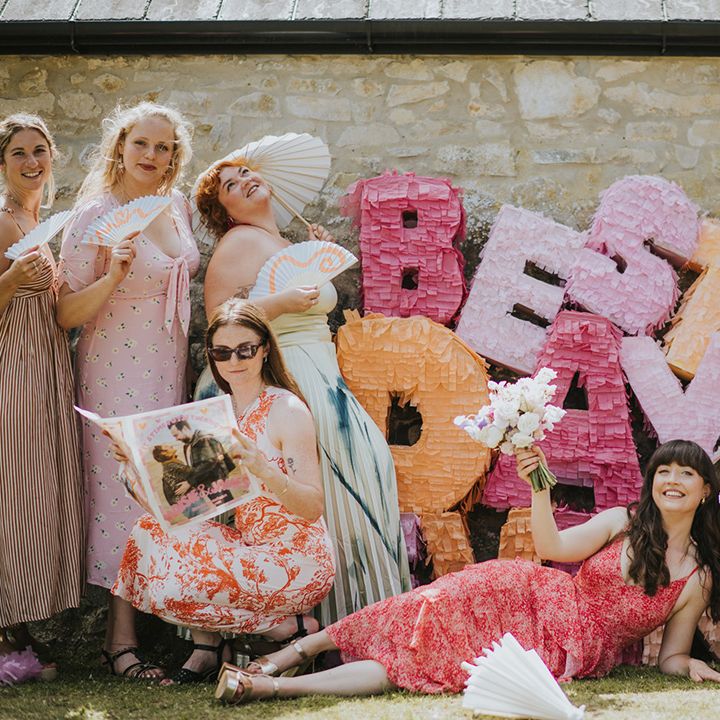 wedding-guests-pose-with-pinata