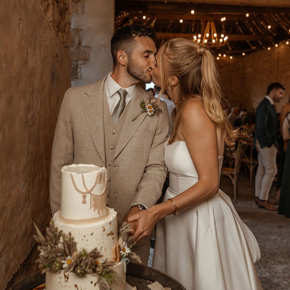 bride-and-groom-cut-wedding-cake