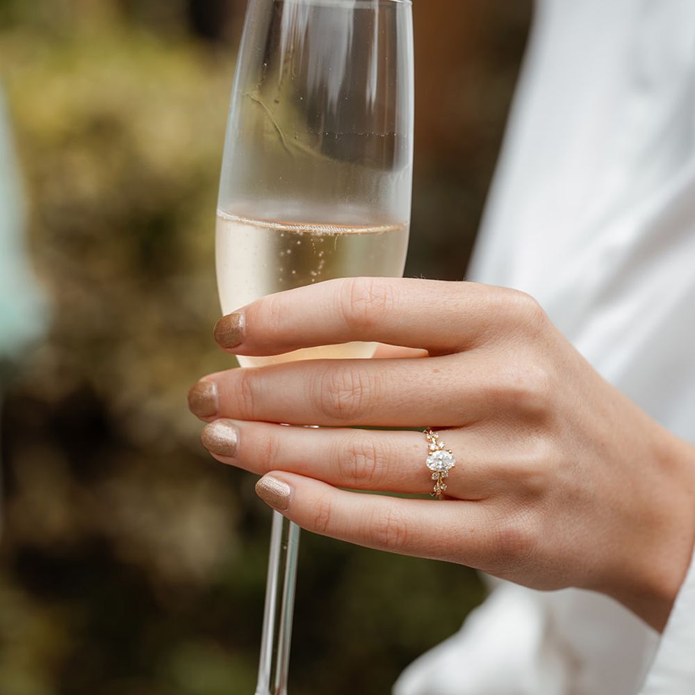 bride-wearing-oval-shaped-diamond-engagement-ring