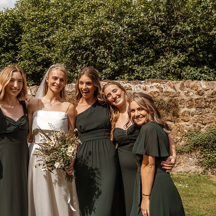 dark-green-bridesmaid-dresses-group-bridal-party-photo