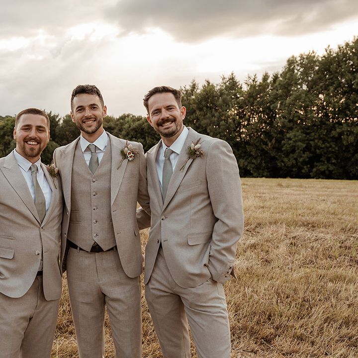 groomsmen-in-matching-three-piece-wedding-suits