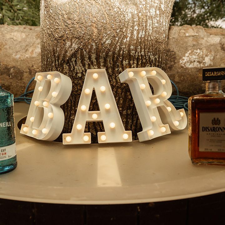 wedding-bar-with-light-up-letters-and-alcohol