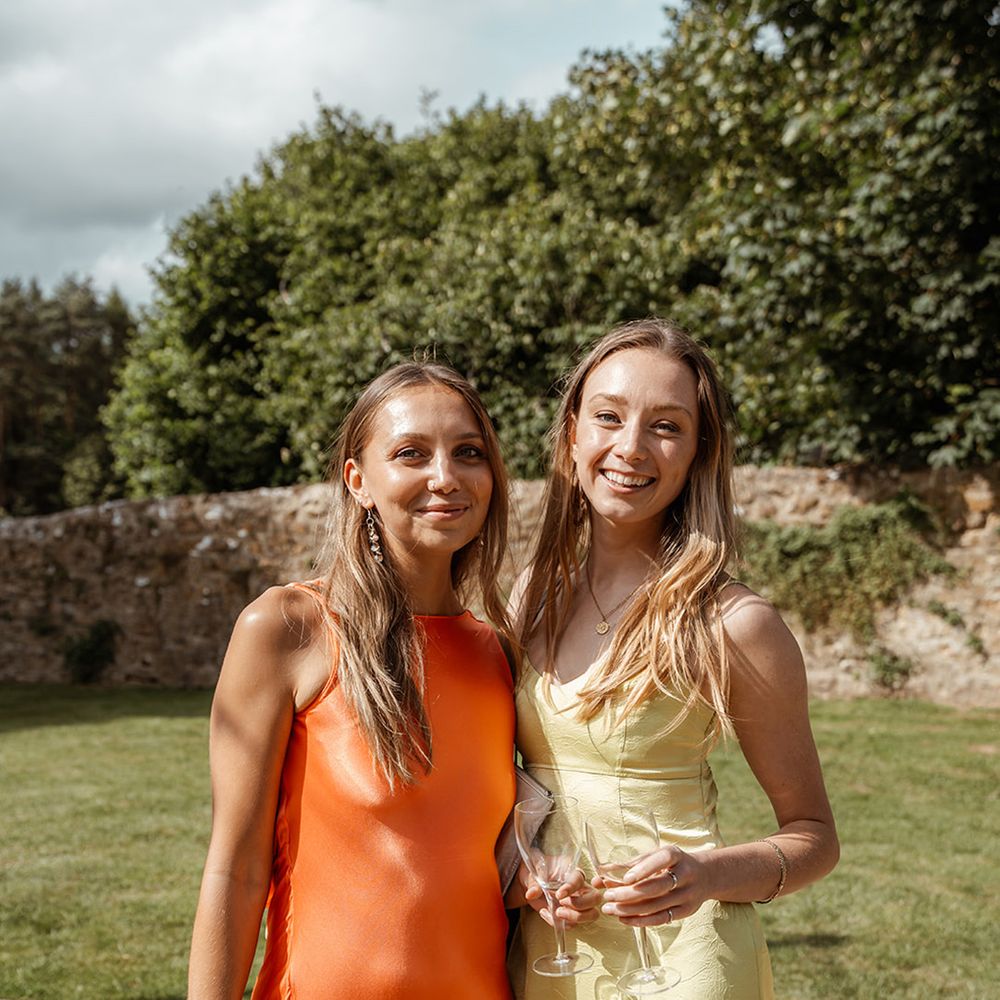 wedding-guests-in-bright-satin-dresses