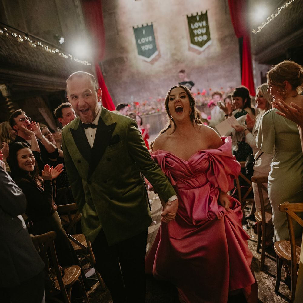 couple-walks-back-down-the-aisle-as-married-couple