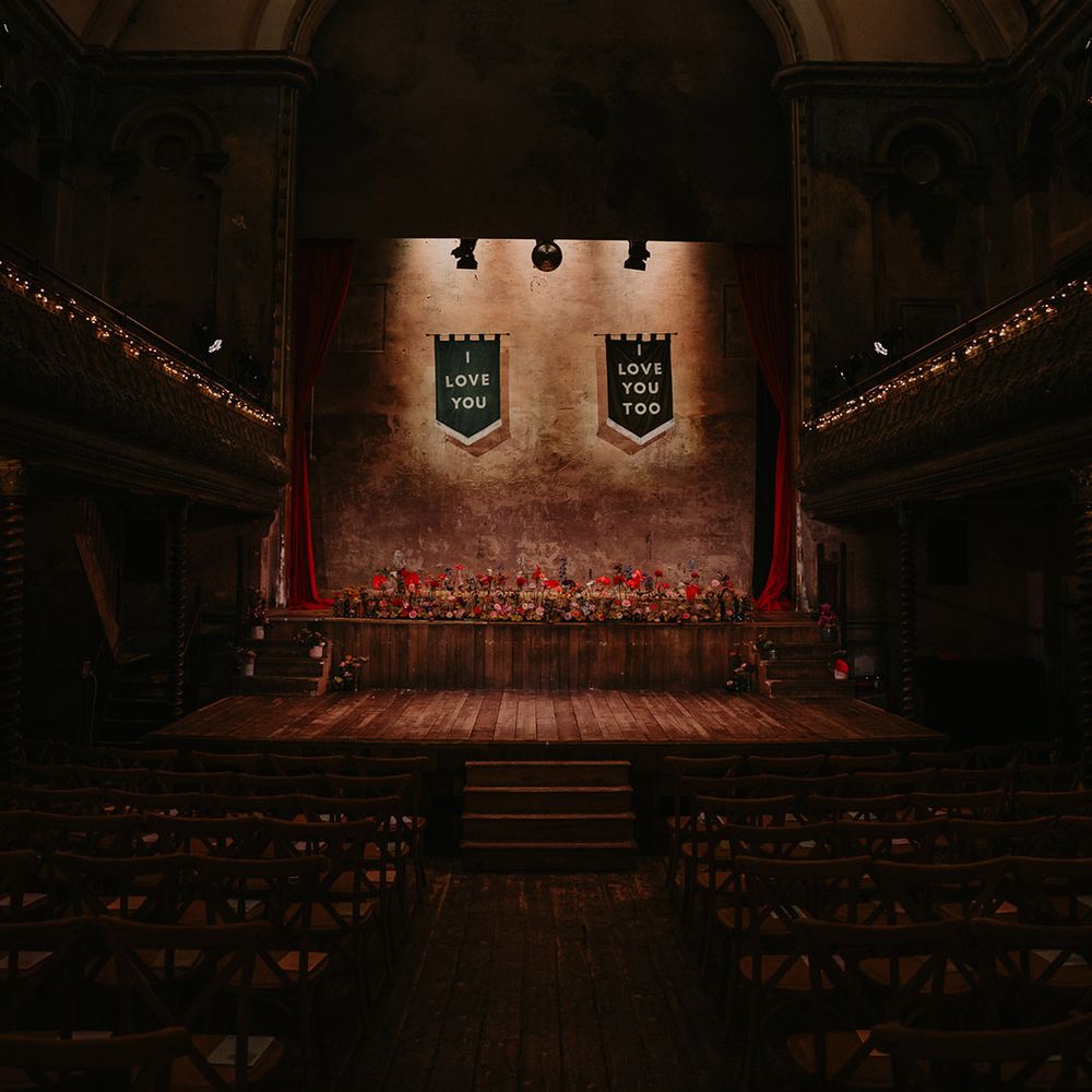 unique-wiltons-music-hall-wedding-venue-with-banner-signs