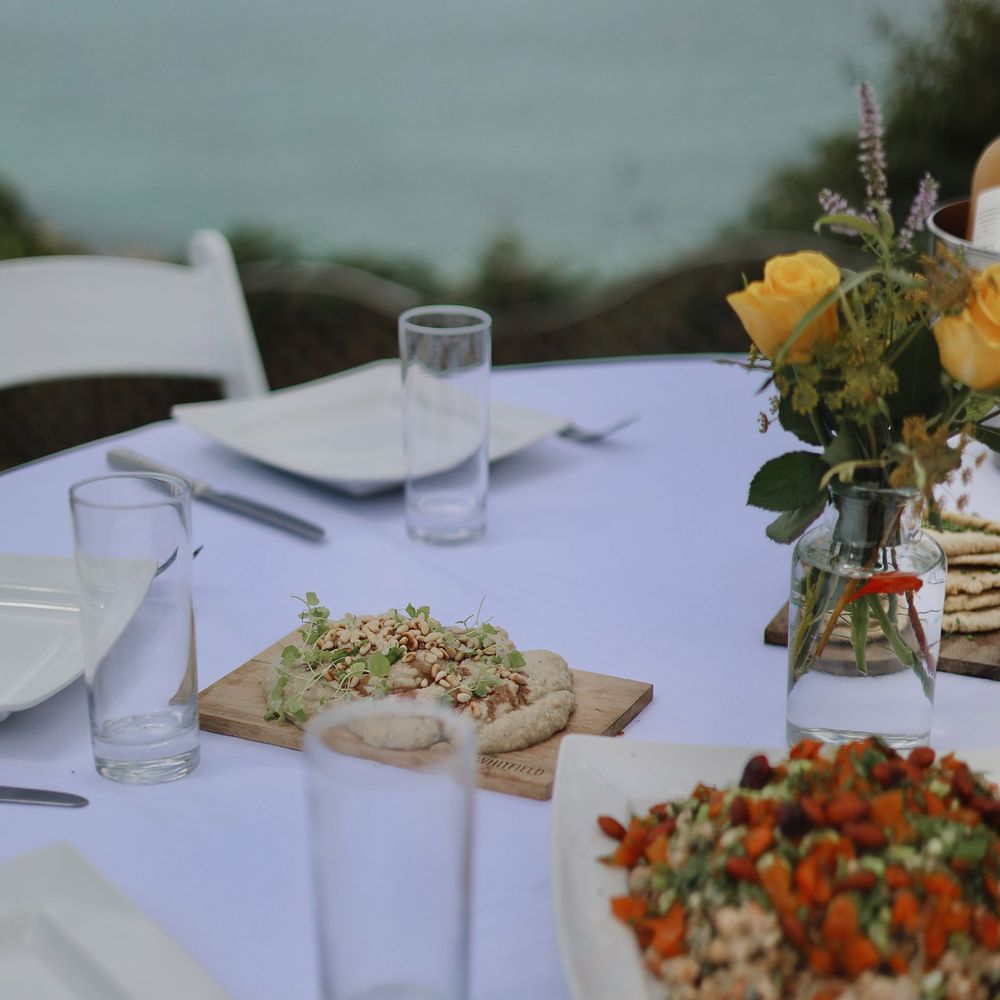 Outdoor lunch with view of sea for wellness hen do at Polhawn Fort