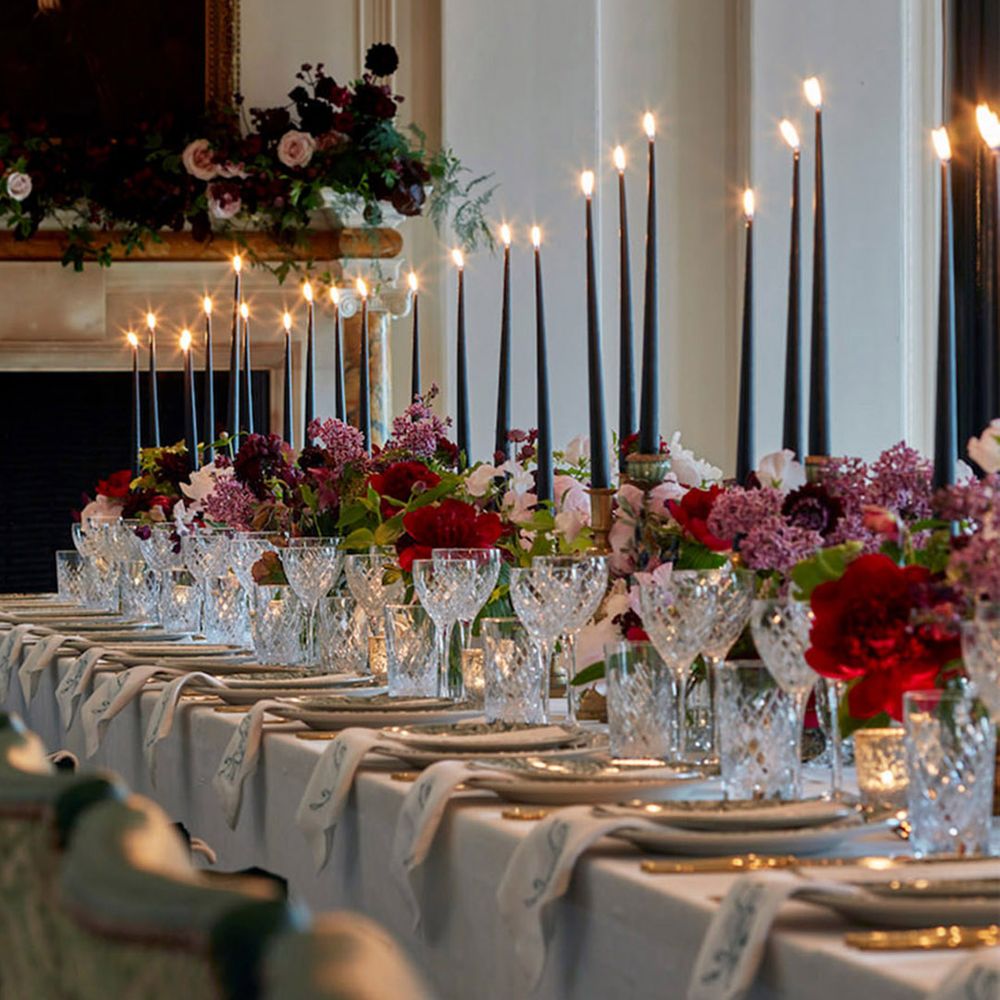 Cosy wedding breakfast with blue candles on table
