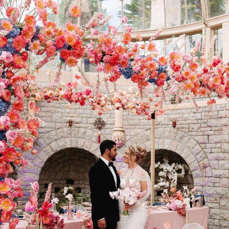 Luxe De Vere Tortworth Court wedding with bright pink decor