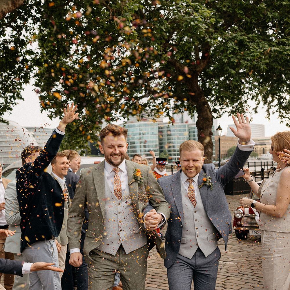 dried-flower-confetti-exit-for-two-grooms-in-tweed-suits