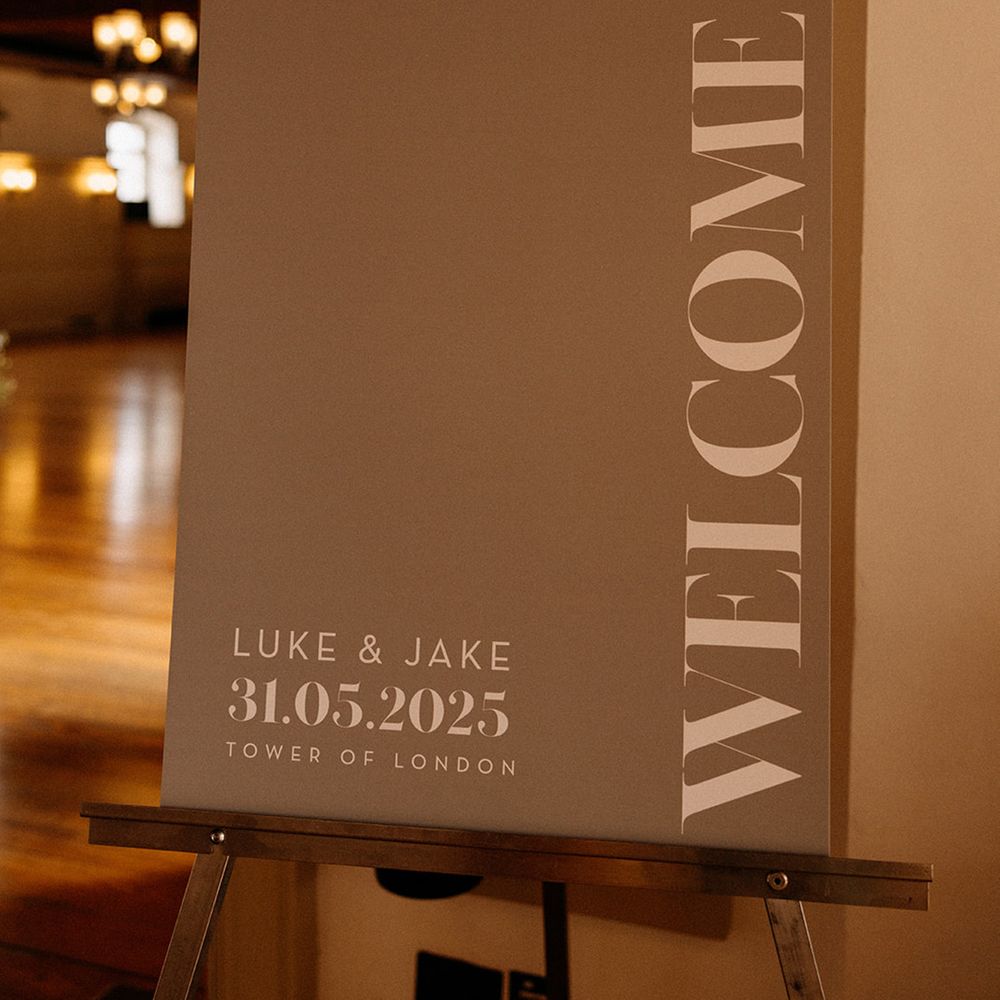 Grey and white neutral wedding welcome signage