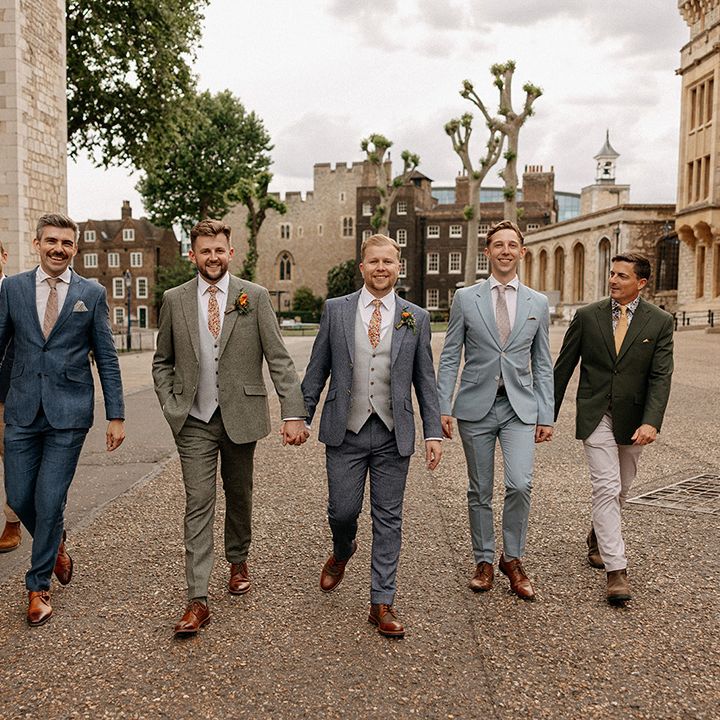 groomsmen-in-blue-green-wedding-suits-at-london-city-wedding