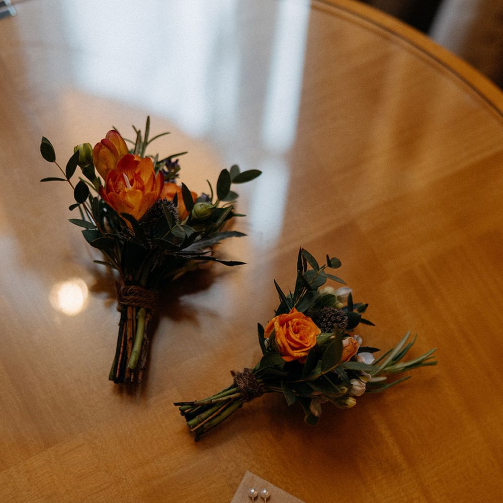 orange-flower-buttonholes