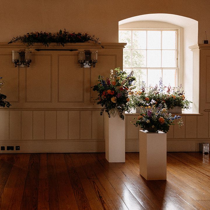 pillars-with-flower-centrepieces-at-tower-of-london-wedding