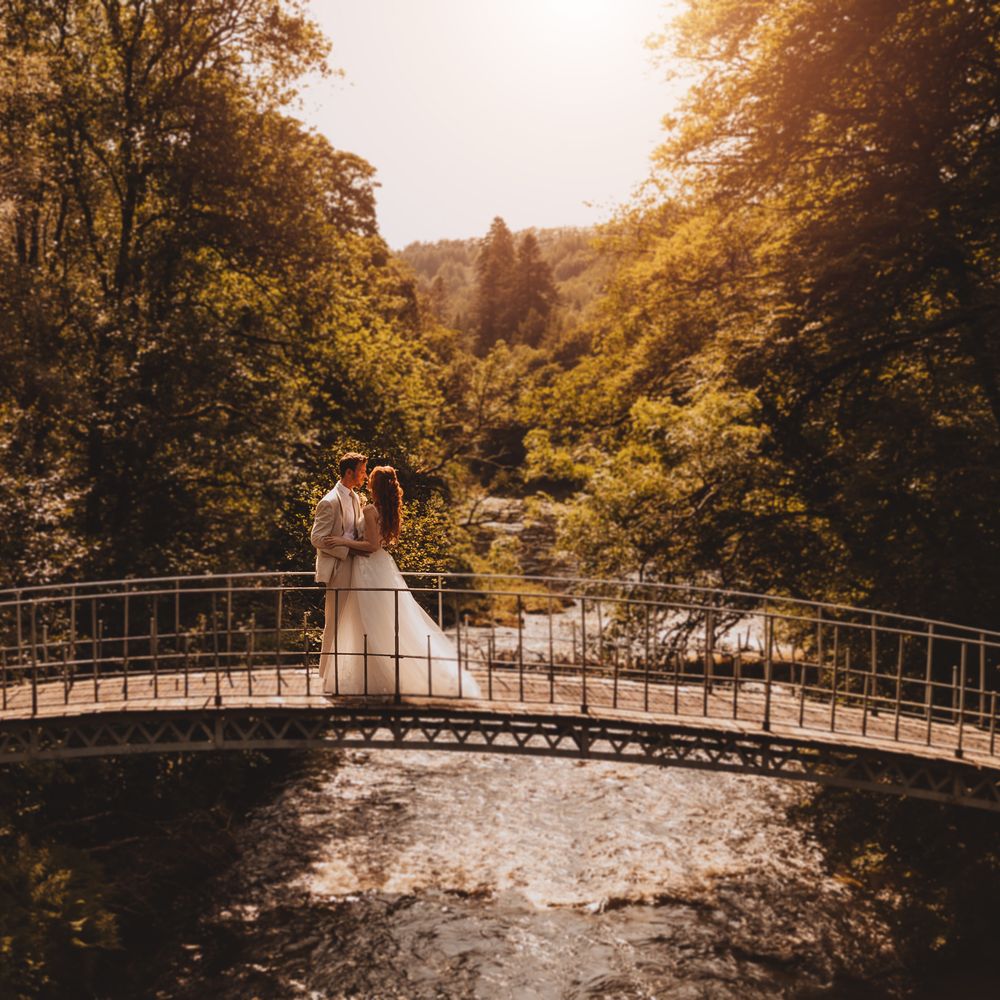 Couple on bridge during golden hour