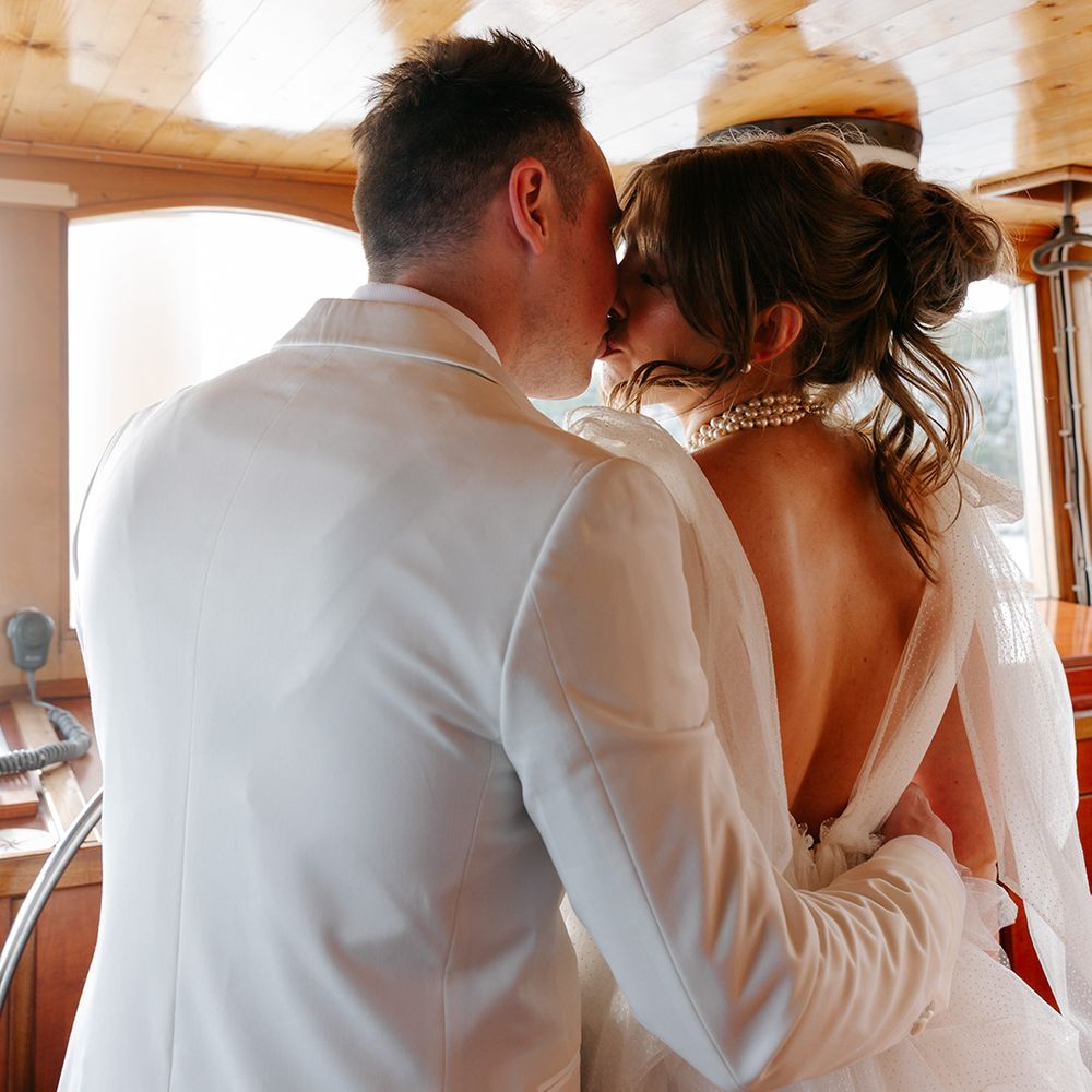 Bride and groom share a kiss
