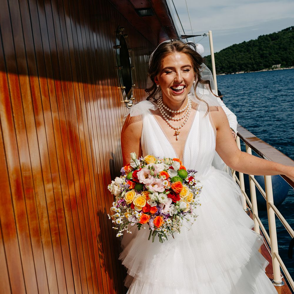 bride-wearing-ruffle-layered-wedding-dress