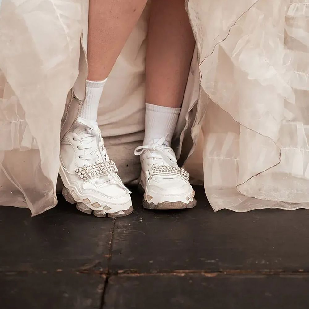 White trainers embellished with rhinestones