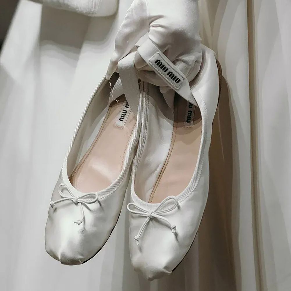 White ballet pumps from Miu Miu