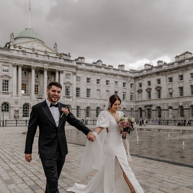 Bride in Puff Sleeve Wedding Dress & Groom in Black Tuxedo For City Wedding