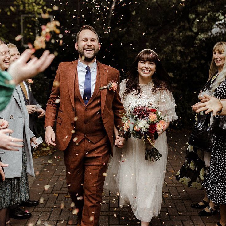 Bride in Skirt & Top & Groom in Three Piece Suit Has Confetti Exit From Registry Office City Wedding