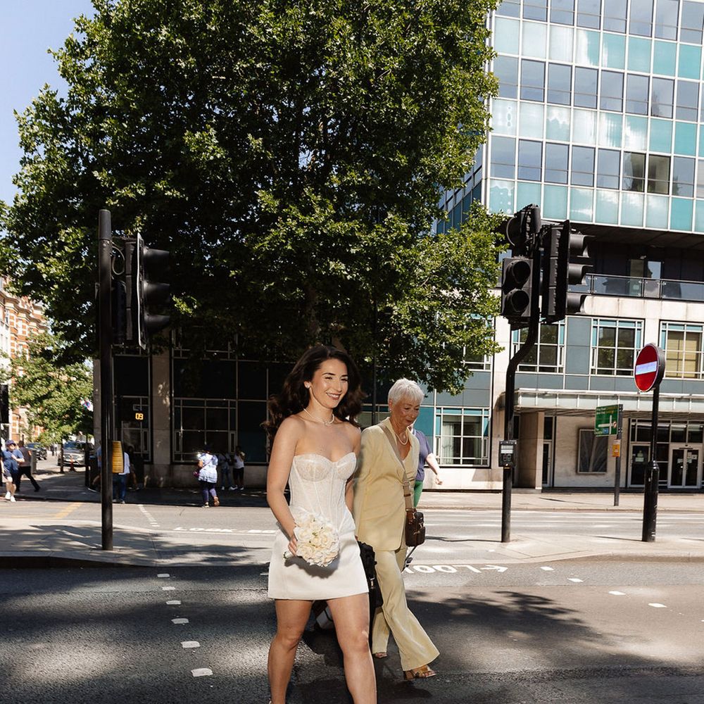 bride-in-corset-and-skirt-wedding-outfit-and-mother-of-the-bride-crossing-the-street