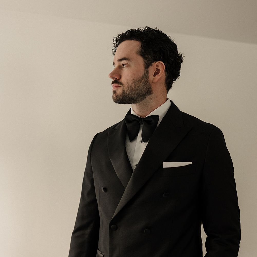 groom-in-black-double-breasted-suit-jacket