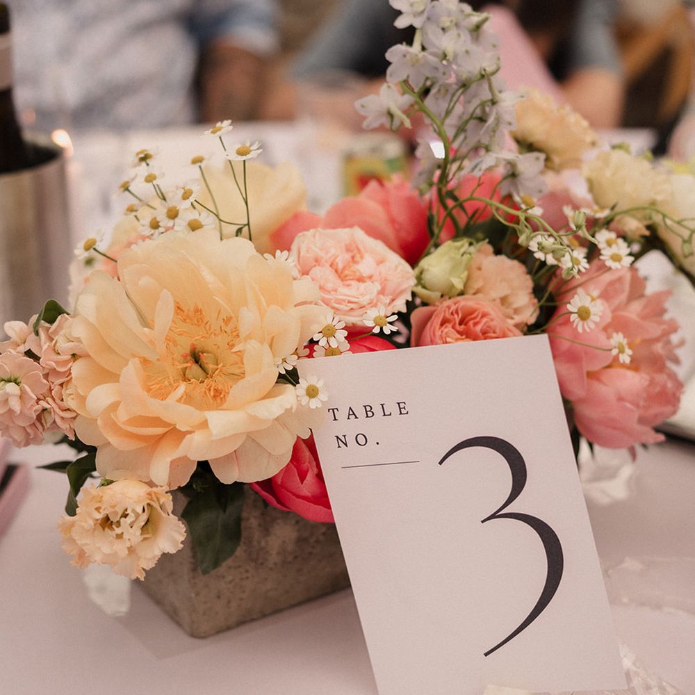 pastel-wedding-table-centrepiece-with-table-number-sign