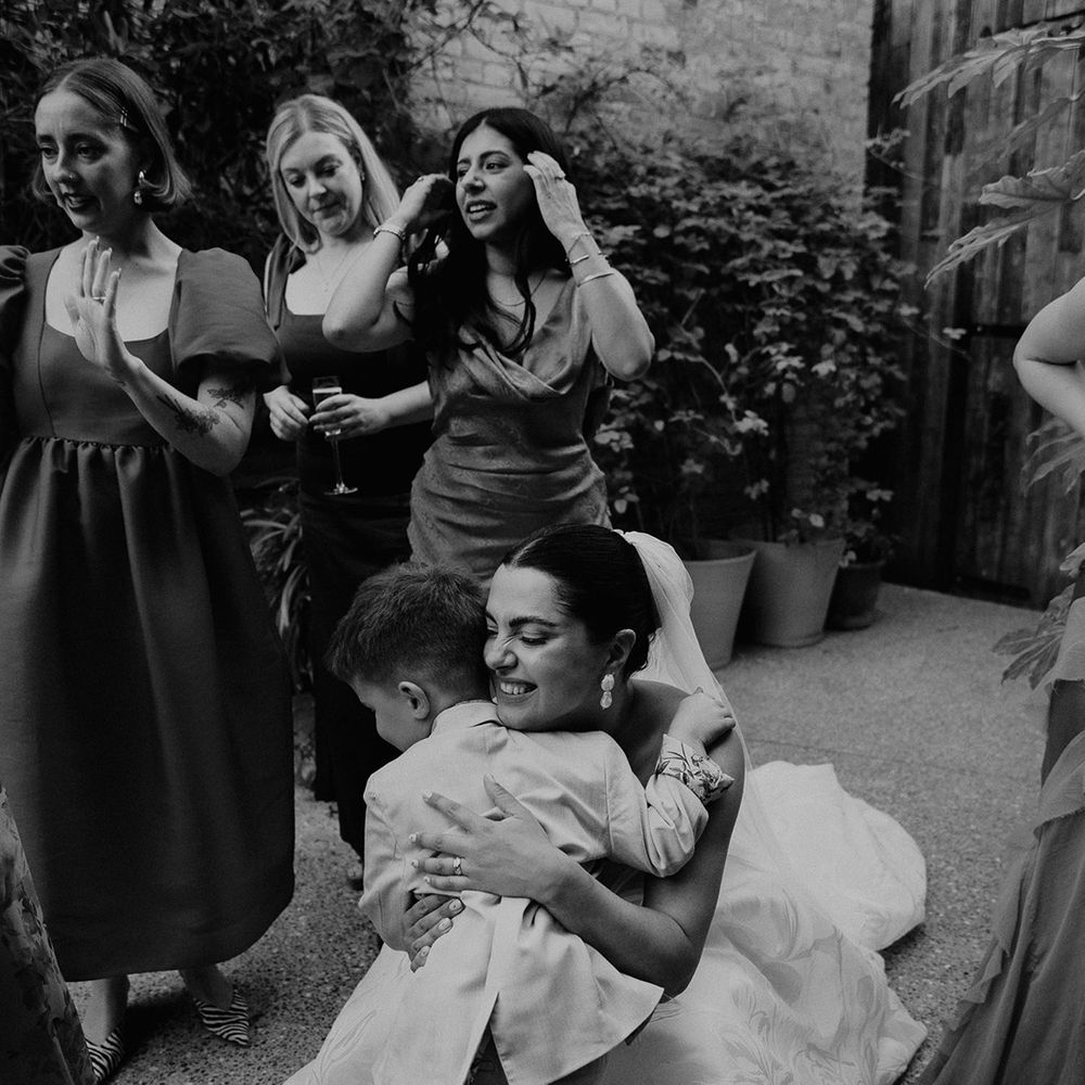 bride-hugs-little-boy-at-wedding-kids-at-wedding