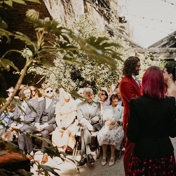 celebrant-conducts-wedding-ceremony-at-100-barrington